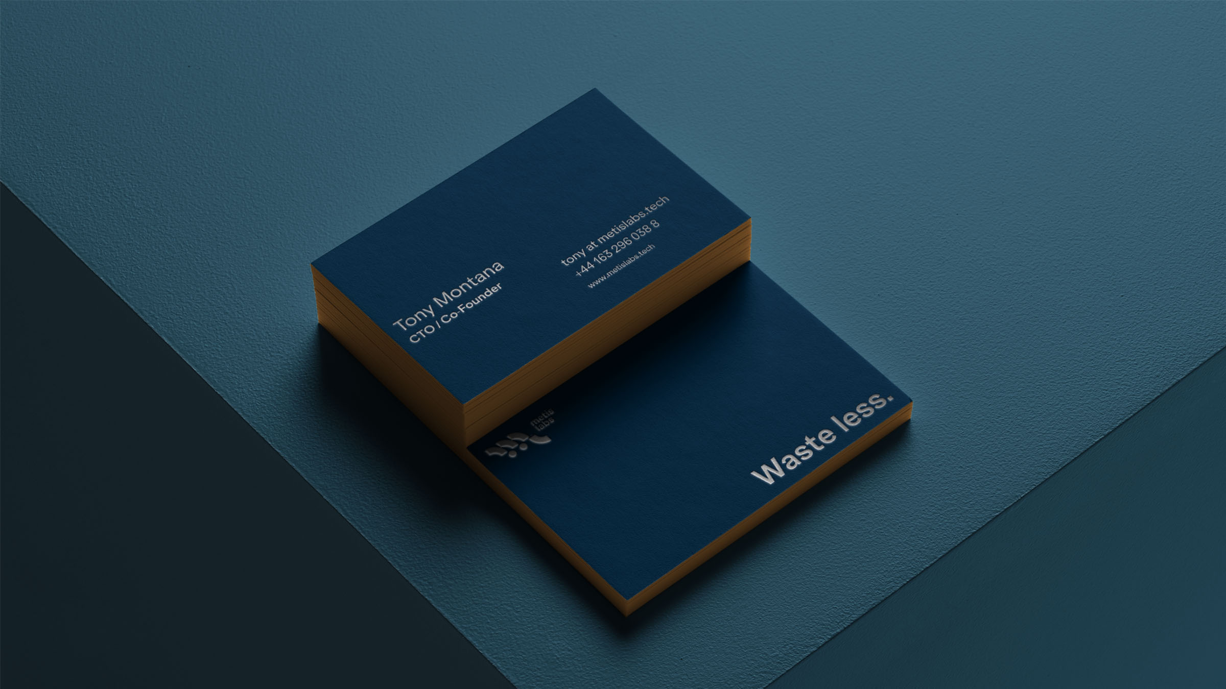 metislabs business cards on a table